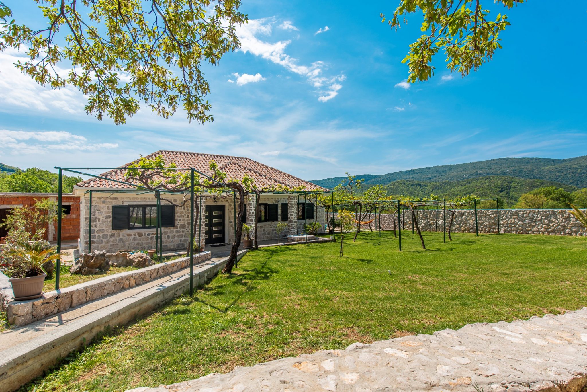 Kotor, Radanovići – new stone house on a large fenced plot