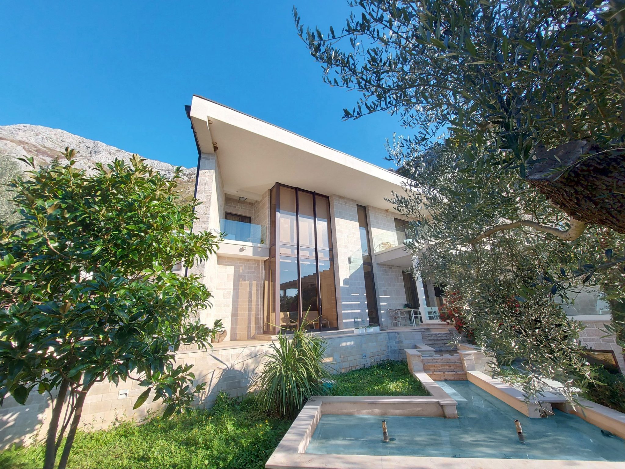 SOLD:            Budva, Rijeka Rezevici – Mediterranean style designer villa among century old olive trees