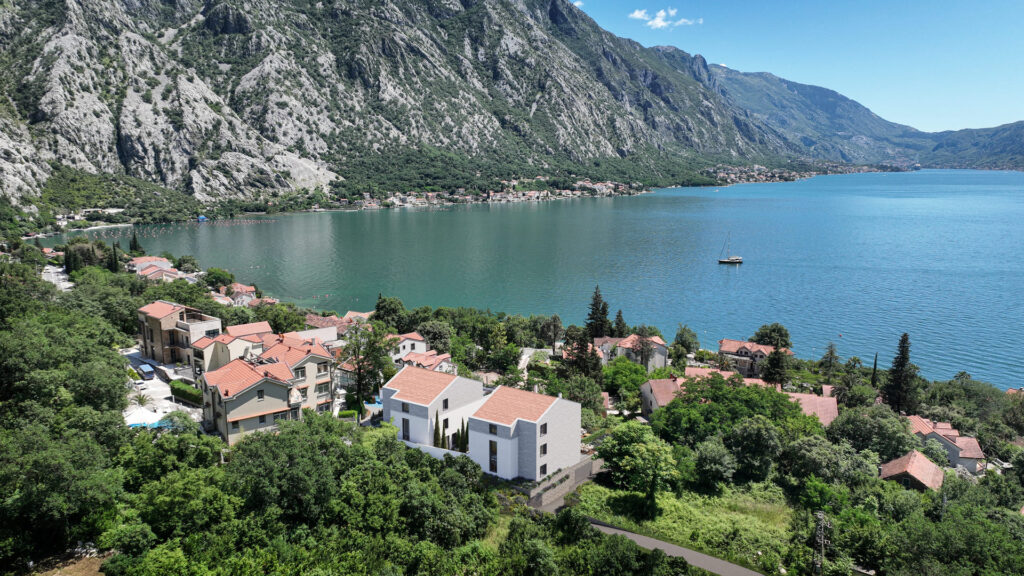 Studio apartman u Orahovcu, Kotor, sa pogledom na more i modernom arhitekturom.