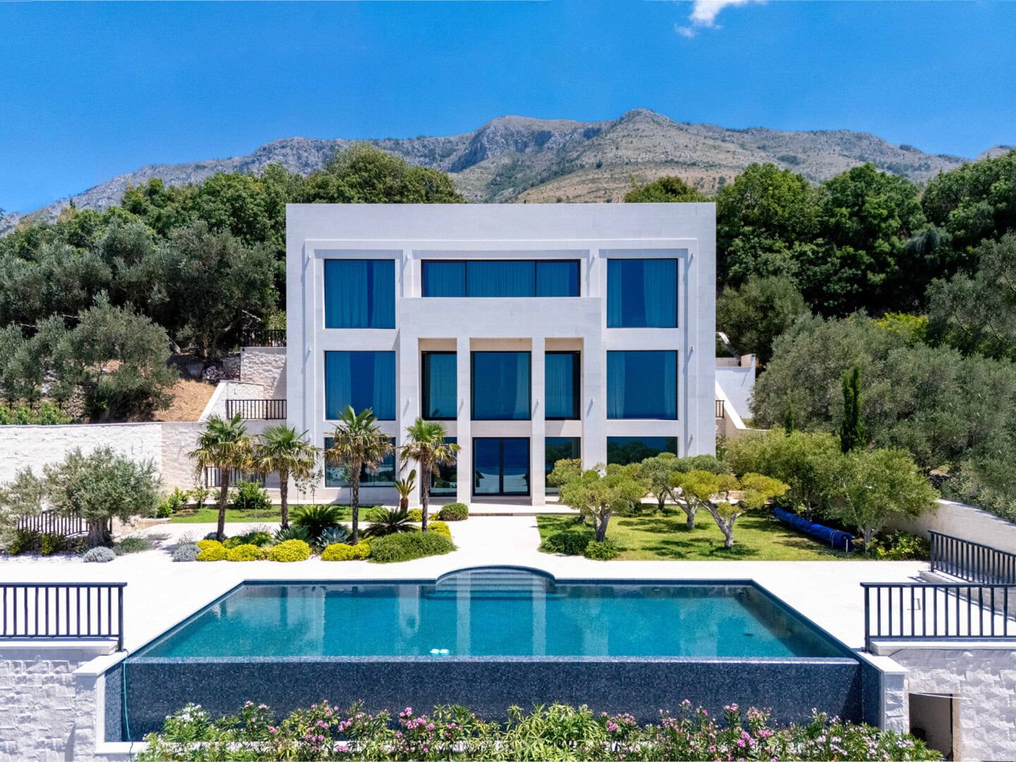 Exclusive villa Skočiđevojka in Budva, Montenegro, a luxury property with a pool and beautiful mountain views.