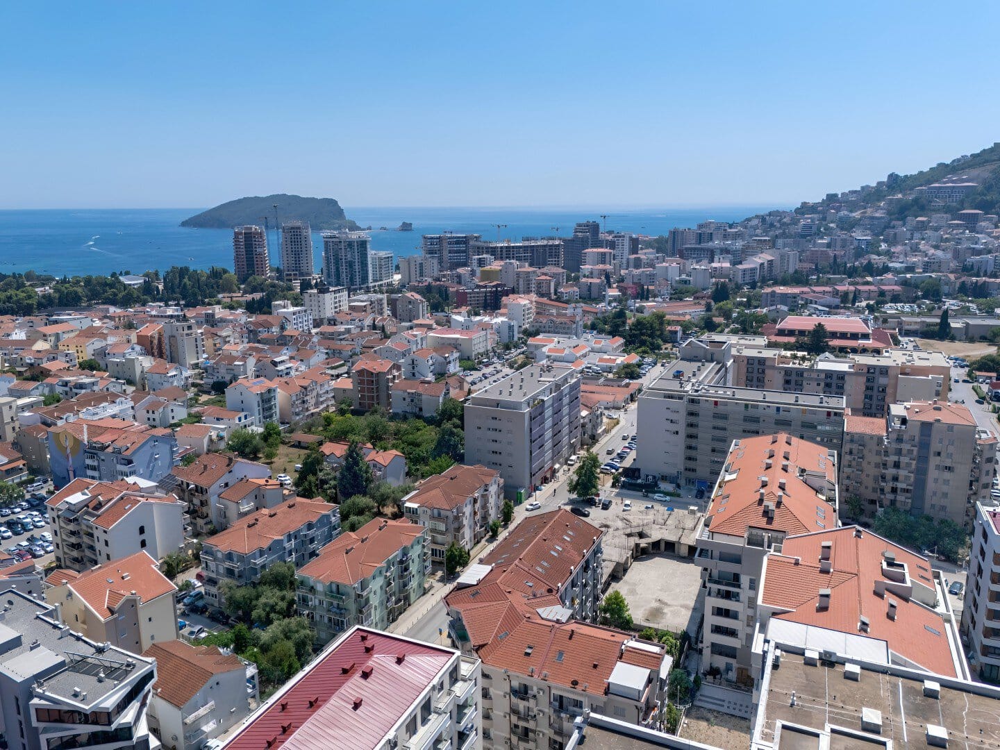 View of Budva, Montenegro, luxury apartment, sea, coast, city, buildings, sea, mountains.